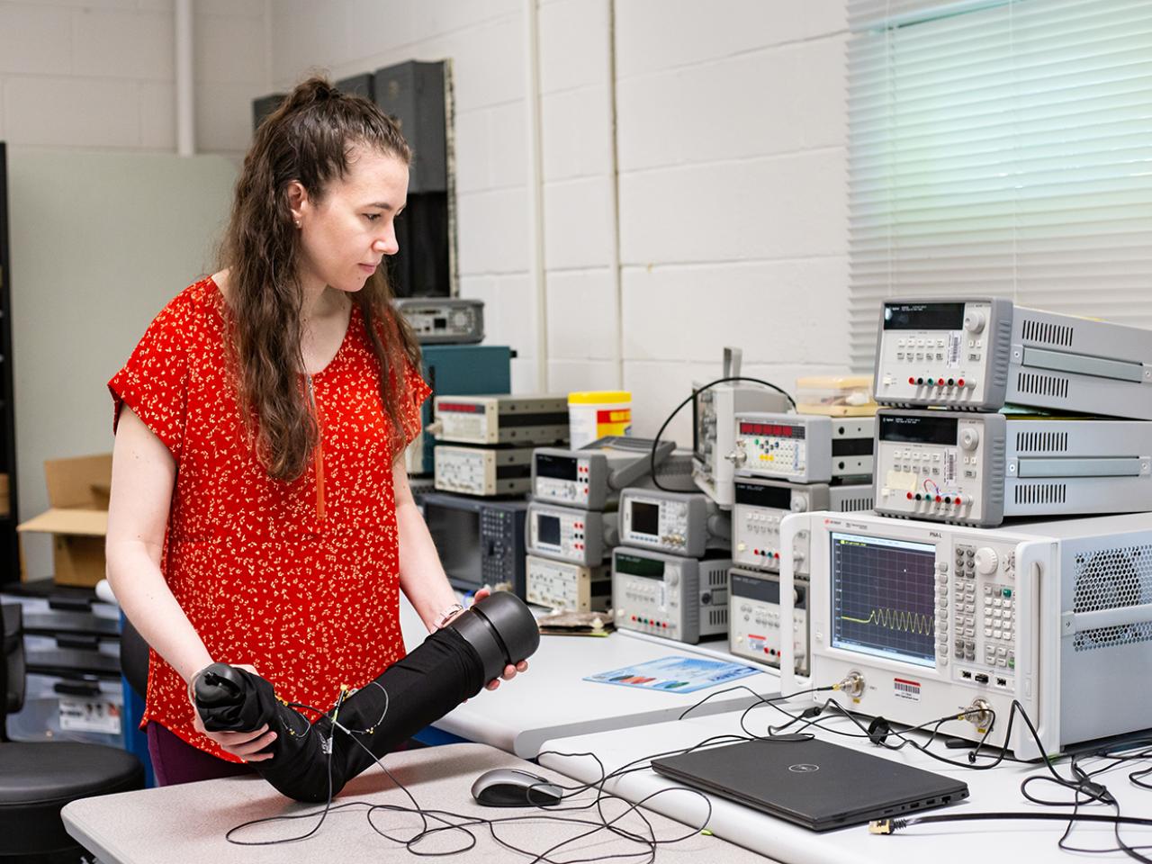 Woman works in ElectroScience Laboratory