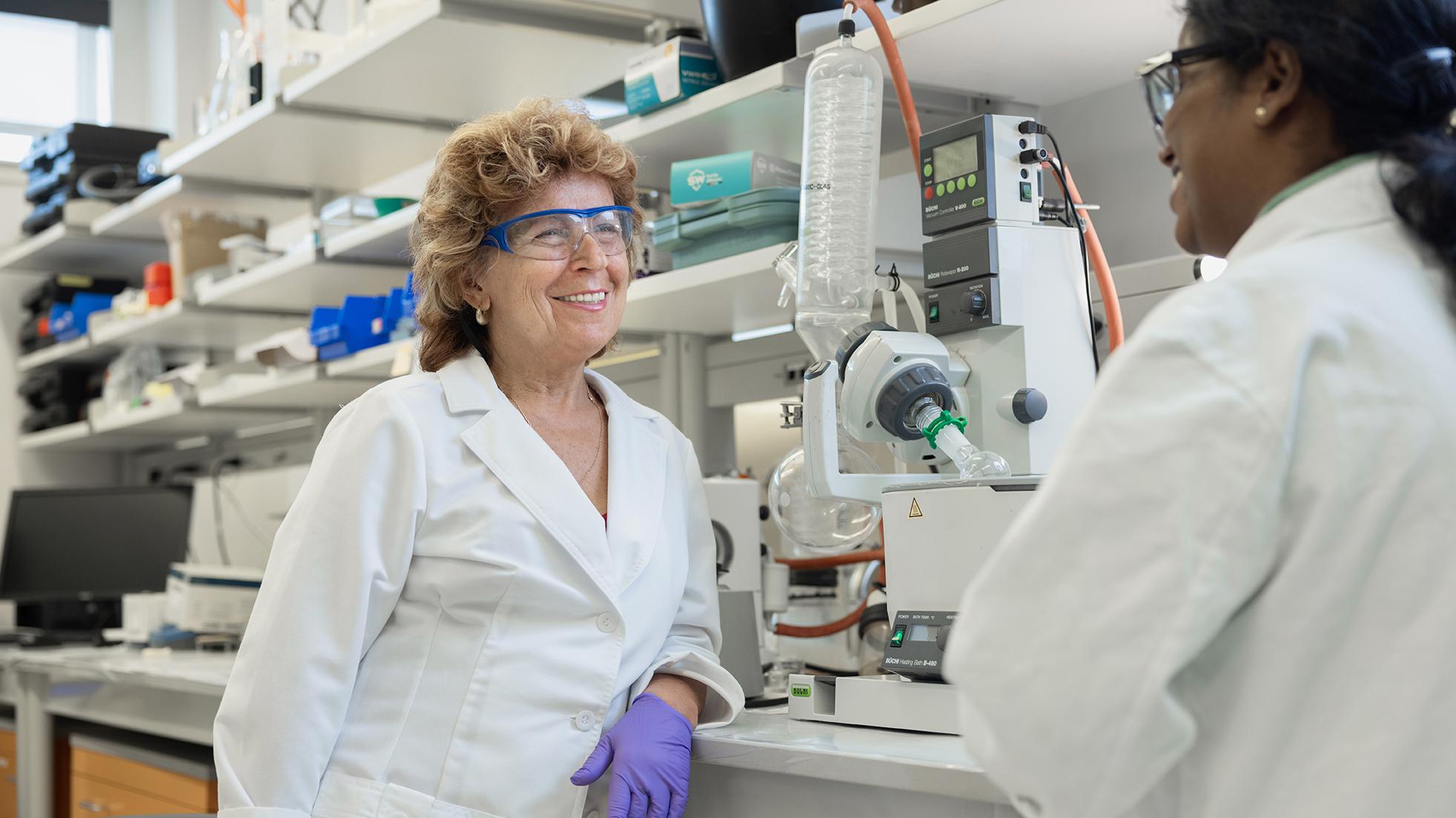 Judit Puskas talks with PHD student Aswathy Sasidharan Pillai in Puskas lab at OARDC.
